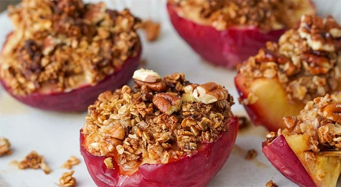 Air fryer baked apples topped with oats and pecans