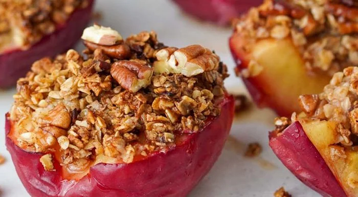 Air fryer baked apples topped with oats and pecans