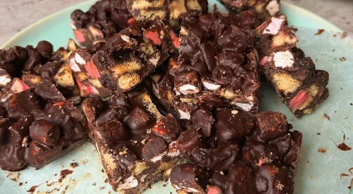 Chocolate protein rocky road squares on a plate