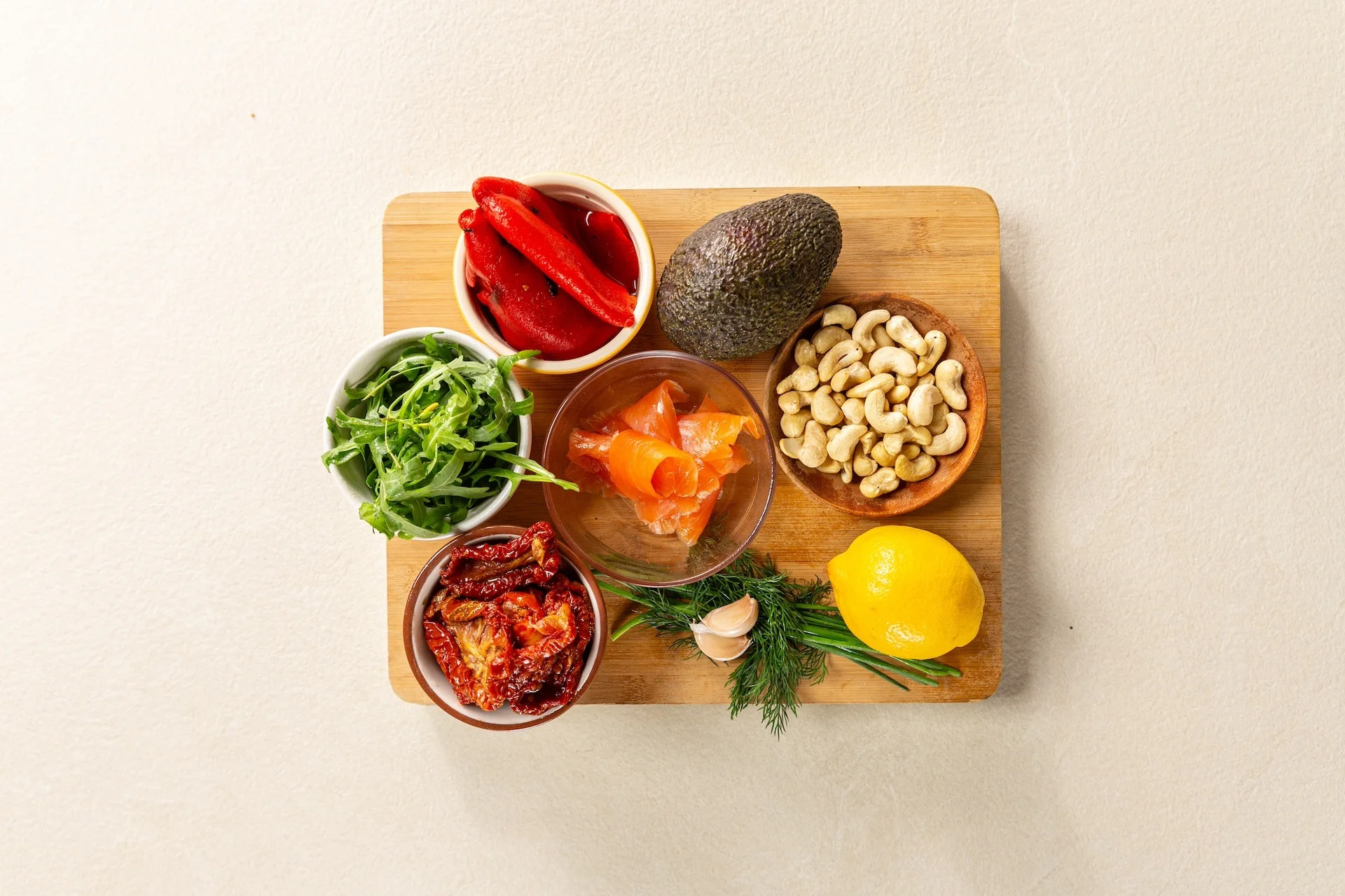 Smoked salmon bagel ingredients set out.