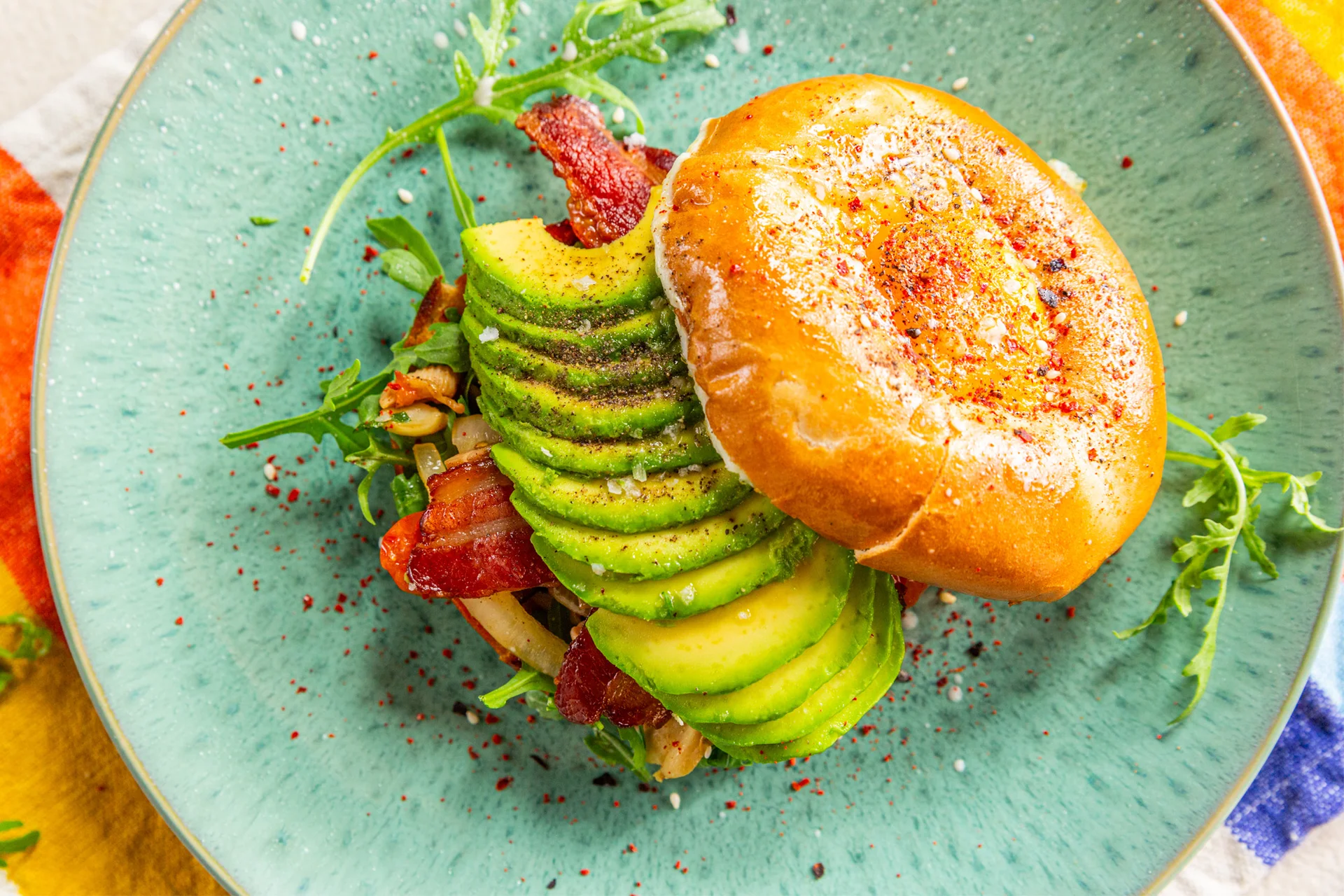 Image of bacon, egg & avocado bagel