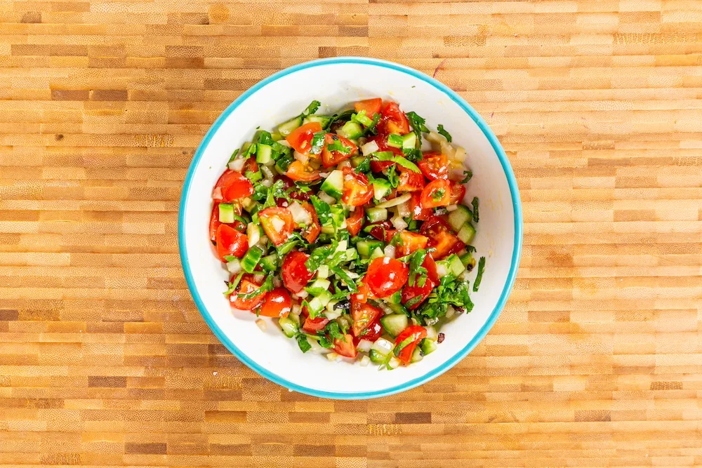 Chopped ingredients mixed together in a bowl.